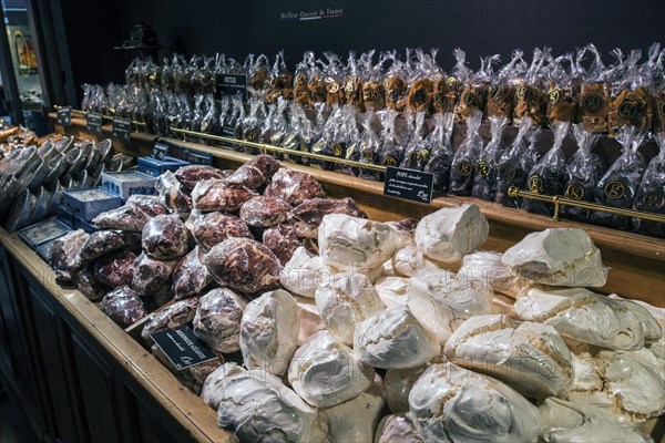 Meringues in the display of a souvenir shop in the Ville Close in Concarneau