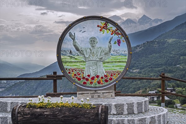 Painted picture on glass of Pope John Paul II in Introd in the Aosta Valley