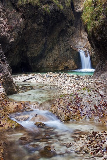 Waterfall in the Almbach river flowing through the Almbachklamm gorge in the Berchtesgaden Alps