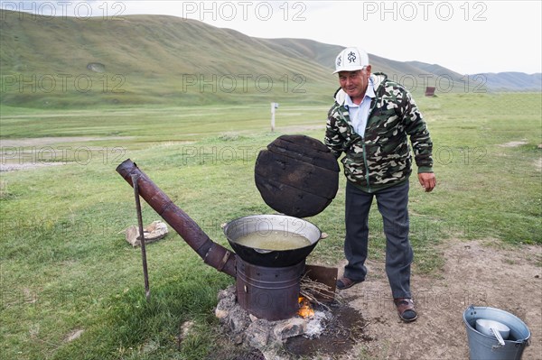 Kazakh nomads preparing noodles