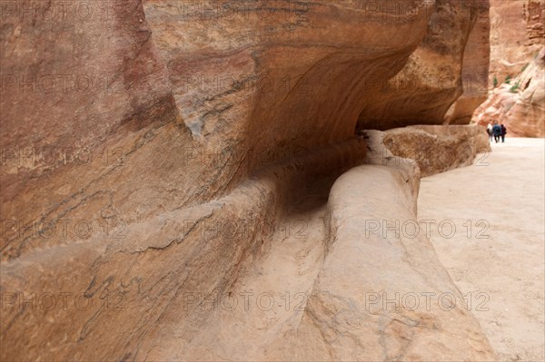 Ancient water conduit in Siq