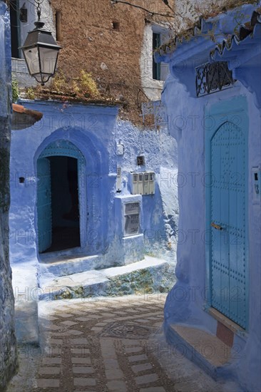 Blue door and building in the alley of the city