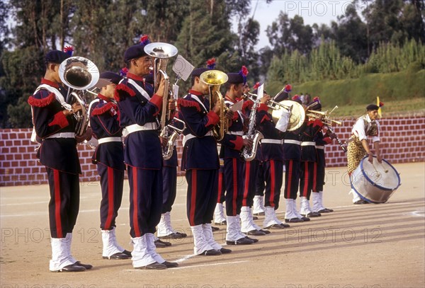 Students Beating retreat during Founder's Day Parade