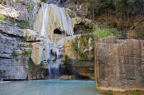 Waterfall in rock face at Tsiribihina River
