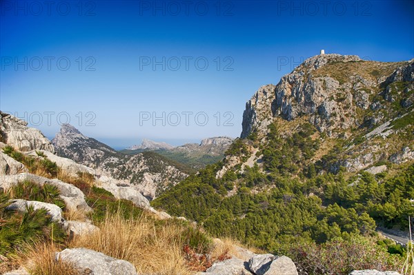 View of coastal landscape and old watchtower