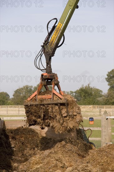 Removal of horse manure from the stable yard