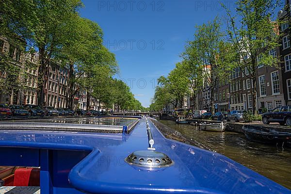 Over the roof of a tourist boat in the canals