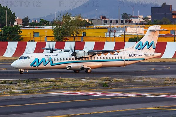 An Aeromar ATR 72-600 aircraft with registration XA-UZE at Mexico City Airport