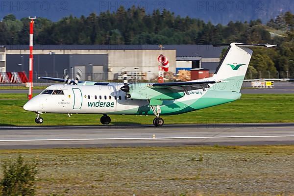 A De Havilland Canada Dash 8-100 Wideroe aircraft with registration LN-WFS at Bergen Airport