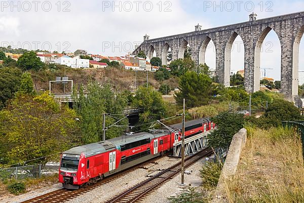 Train at the Aqueduct Aqueduto das Aguas Livres Railway in Lisbon
