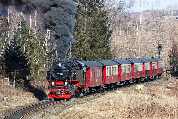 Steam train of the Brockenbahn railway leaving Drei Annen Hohne