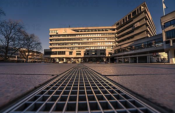 View over ground grids of the historic town hall in the evening light