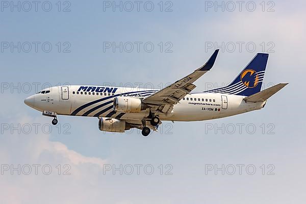 A Magnicharters Boeing 737-300 aircraft with registration XA-VDM at Mexico City Airport