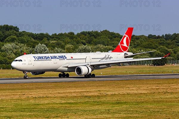 A Turkish Airlines Airbus A330-300 with registration TC-JNS at Hamburg Airport