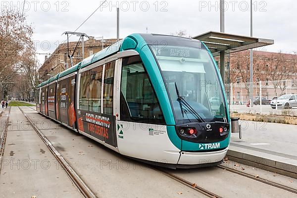 Modern tram of the type Alstom Citadis of Tram Barcelona at the stop Ciutadella Vila Olimpica public transport public transport transport transport in Barcelona