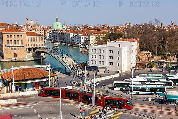 Tram on rubber wheels Tram Venezia and bus station at Piazzale Roma in Venice