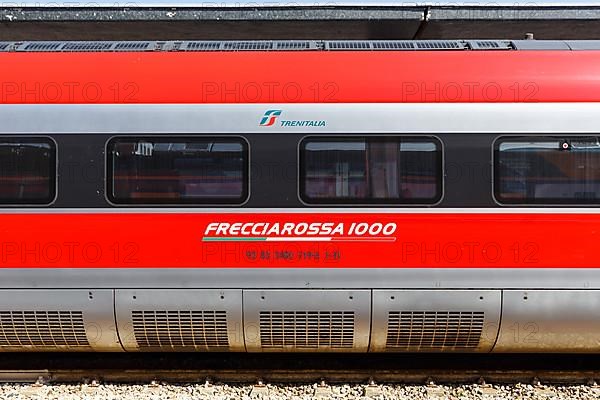 Carriage with logo of Frecciarossa FS ETR 1000 high speed train of Trenitalia at Venezia Santa Lucia station in Venice