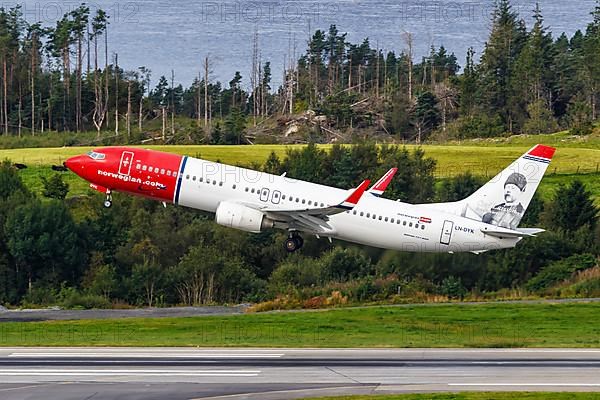A Norwegian Boeing 737-800 aircraft with registration LN-DYK at Bergen Airport