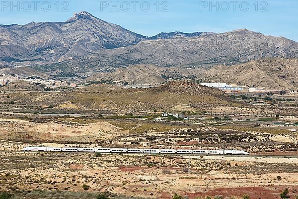 Talgo 250 high-speed train of RENFE AVE in the Sierra del Cid near Alicante