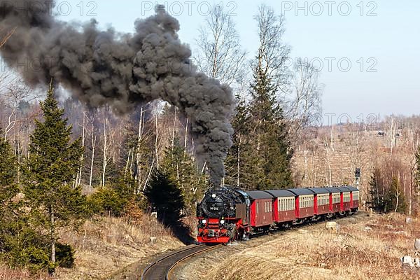 Steam train of the Brockenbahn railway leaving Drei Annen Hohne