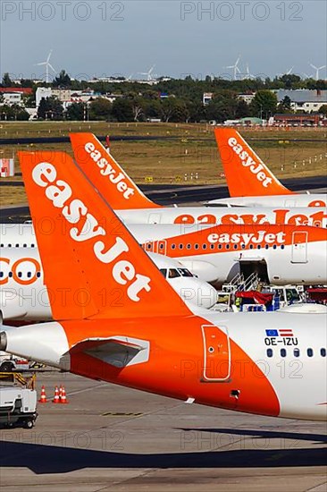 Tails of Airbus A320 aircraft of EasyJet at Tegel Airport in Berlin