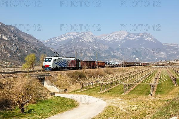 Locomotion goods train on the Brenner railway near Avio