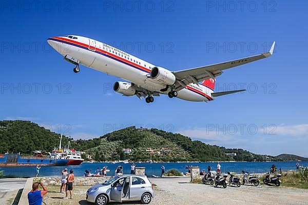 A Meridiana Boeing 737-800 aircraft with registration EI-FFK lands at Skiathos airport