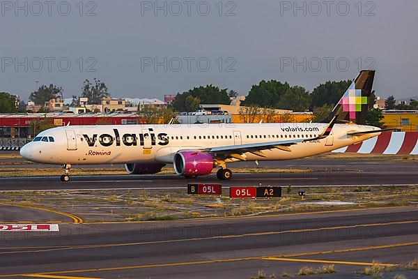 A Volaris Airbus A321neo aircraft with registration N542VL at Mexico City Airport