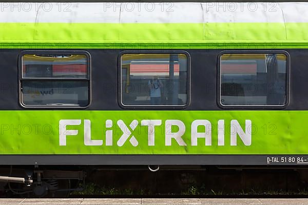 Flixtrain logo on a train at the main station in Stuttgart