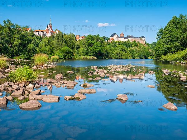 Mildenstein Castle and the town of Leisnig above the river Freiberger Mulde