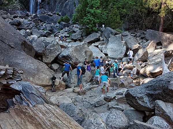 Tourists on boulders