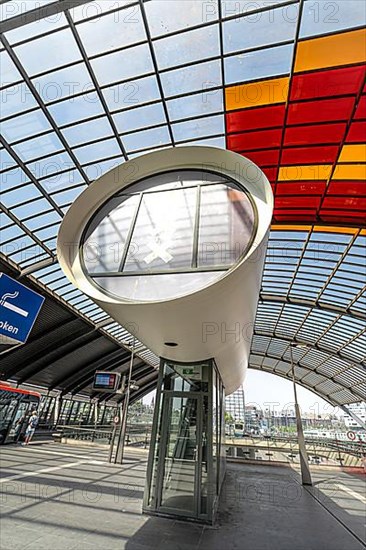 Futuristic bus station with glass roof