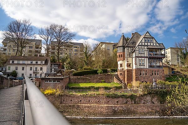 View of the Nagold riverbank with historic house