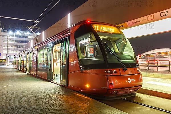 Tram on rubber wheels Tram Venezia of the Translohr type at Piazzale Roma at night in Venice