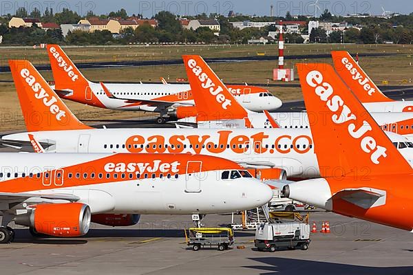 Tails of Airbus A320 aircraft of EasyJet at Tegel Airport in Berlin