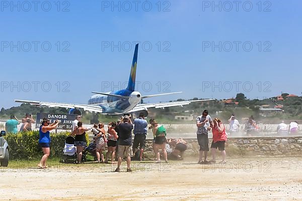 A Thomas Cook Boeing 757-200 aircraft with registration G-TCBC takes off from Skiathos Airport