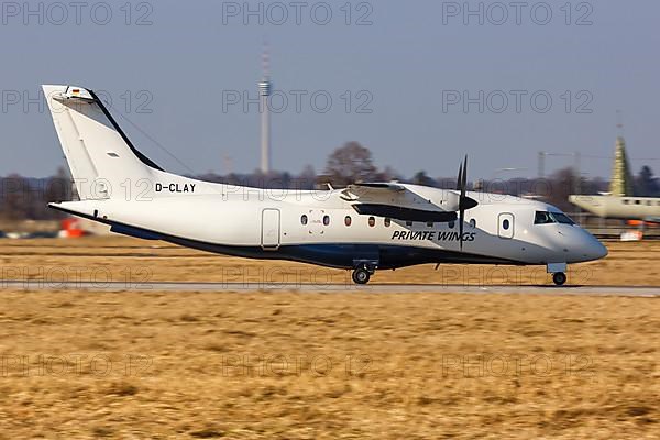 A Fairchild Dornier 328 Private Wings aircraft with registration D-CLAY at Stuttgart Airport