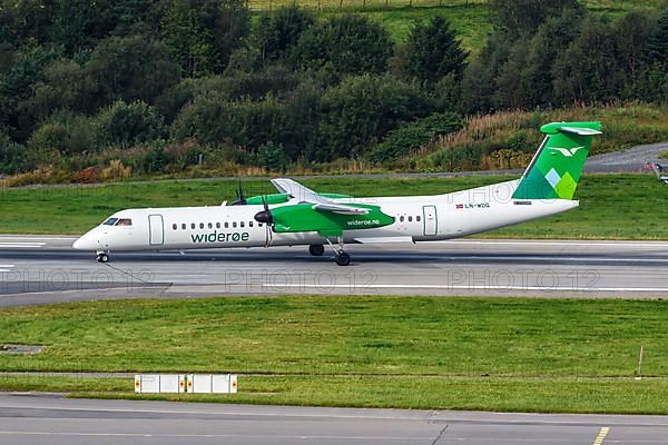 A De Havilland Canada Dash 8 Q400 aircraft of Wideroe with registration LN-WDG at Bergen Airport