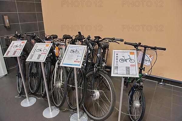 Exhibition for electric bicycles with information about equipment and prices