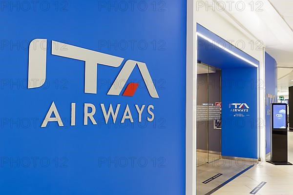 ITA Airways logo on a lounge at Rome Fiumicino Airport