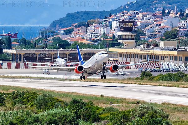 A Boeing 737 aircraft of SAS Scandinavian Airlines takes off from Skiathos Airport