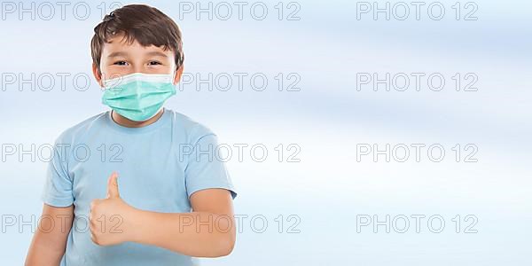 Child Boy with Mask against Corona Virus Corona Virus Showing Thumbs Up Isolated Released in Stuttgart