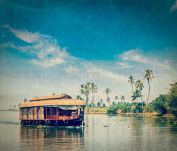 Vintage retro hipster style travel image of travel tourism Kerala background