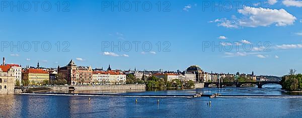 Panorama of Prague Stare Mesto embankment and Vltava river view from Charles bridge. Prague