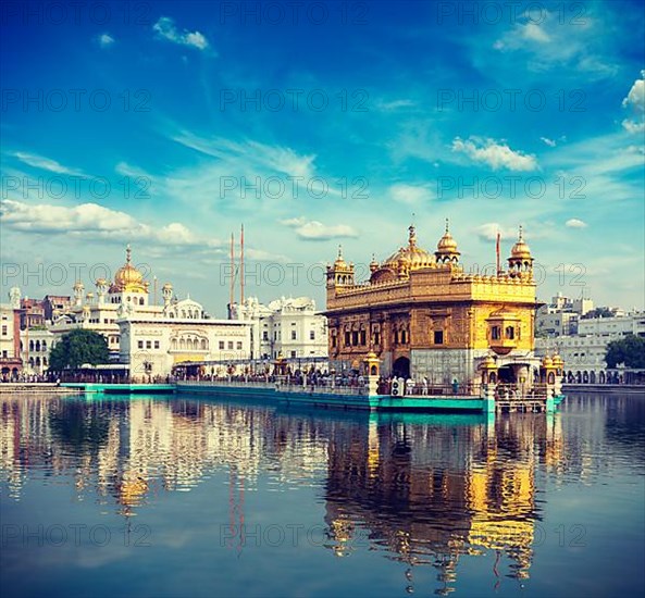 Vintage retro effect filtered hipster style travel image of Sikh gurdwara Golden Temple