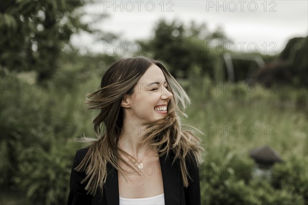 Laughing young woman in portrait