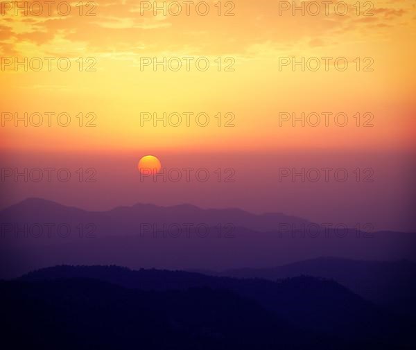 Vintage retro effect filtered hipster style travel image of sunset in Himalayas. Shimla