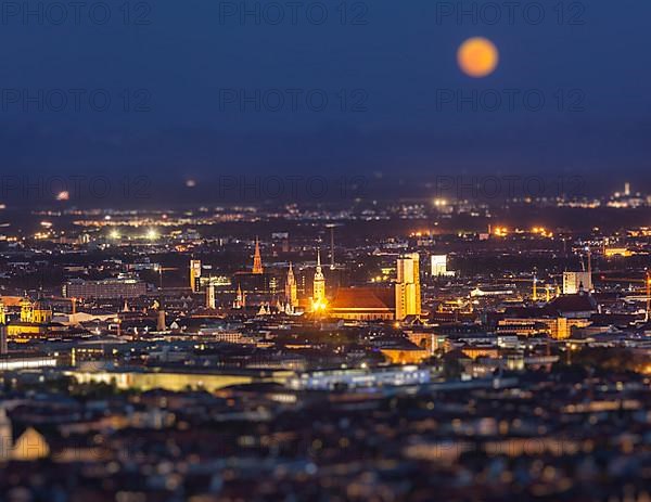 Night aerial view of Munich from Olympiaturm Olympic Tower with tilt shift toy effect shallow depth of field. Munich