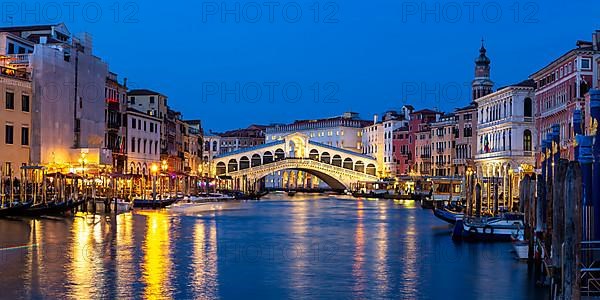Rialto Bridge Rialto Bridge over Canal Grand with Gondola Vacation Travel City Panorama at Night in Venice