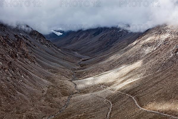 Himalayan valley landscape with road near Kunzum La pass